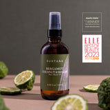 A bottle of the award-winning SUDTANA Bergamot Coconut & Sesame Hair Mask Oil, a natural nourishing oil blend for deep hair repair and shine.