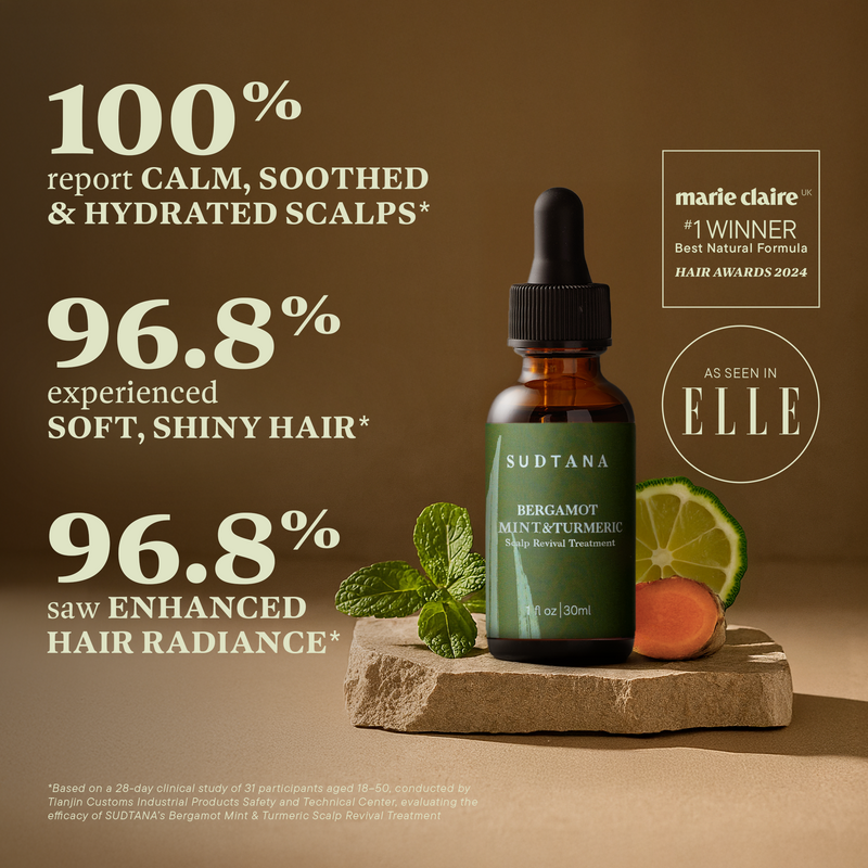 A bottle of the award-winning SUDTANA Bergamot Mint & Turmeric Scalp Revival Treatment, an all-natural dry scalp treatment designed to nourish and strengthen your hair from roots to ends.