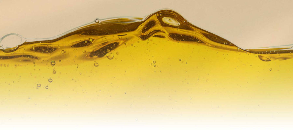 Organic Thai oils with rich texture, sustainably sourced for SUDTANA's natural hair and skincare treatments.