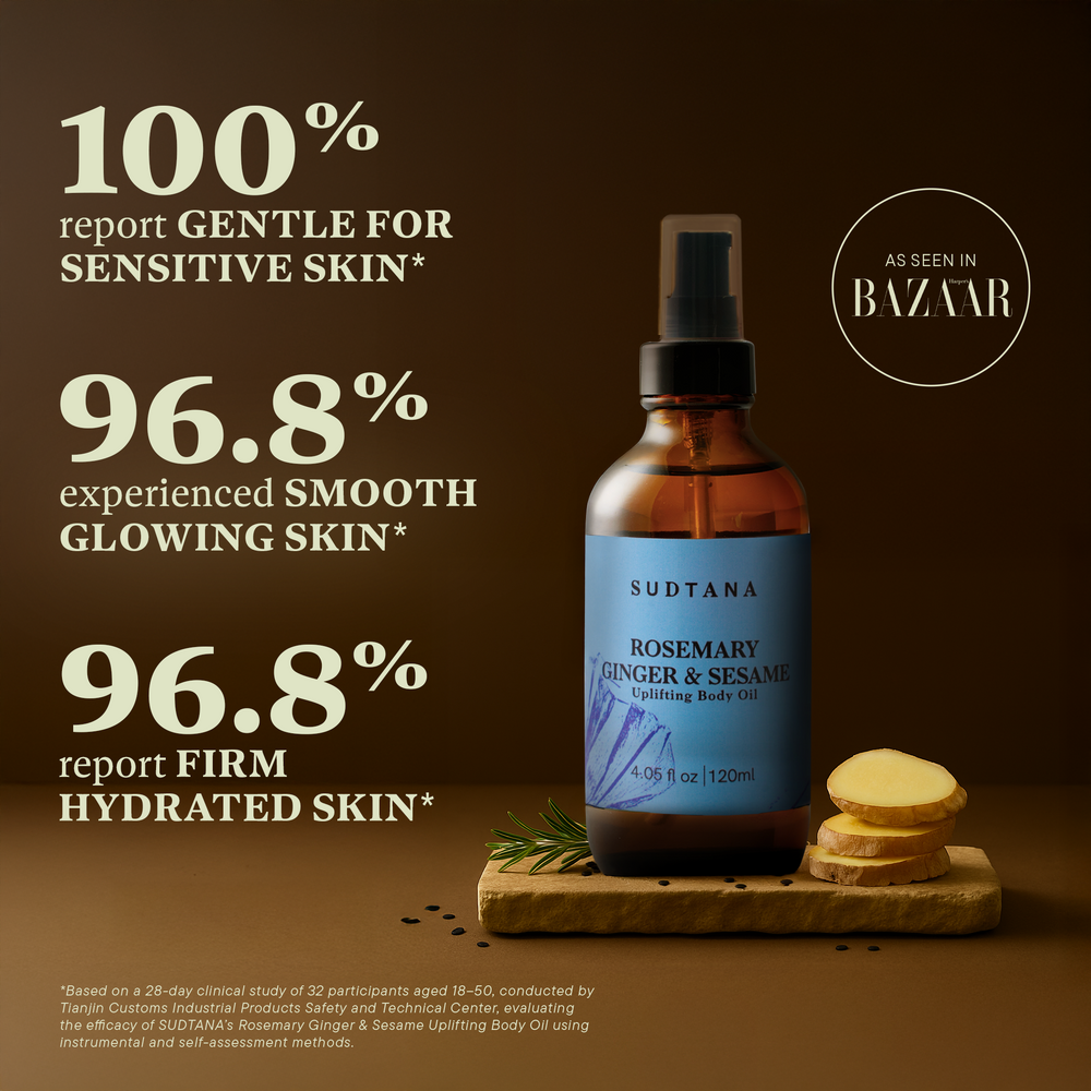 A bottle of the #1-recommended SUDTANA Rosemary Ginger & Sesame Uplifting Body Oil, an all-natural blend of botanical oils clinically proven to soften, smoothen, and rejuvenate your skin. 